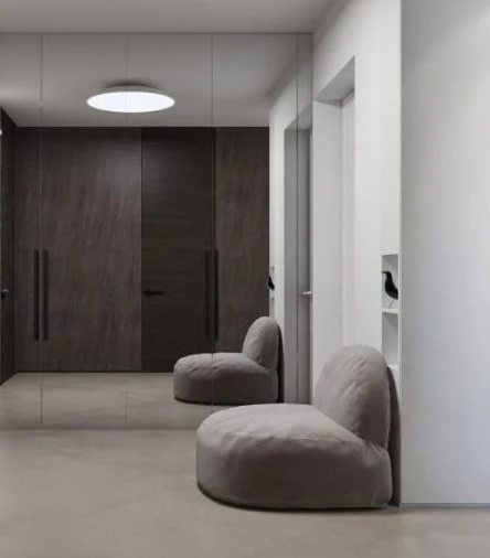 Мягкая мебель в прихожей хай-тек наиболее часто представлена банкетками и пуфами